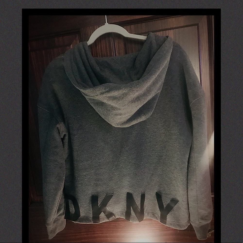 Women’s grey labeled on the back, DKNY in black.